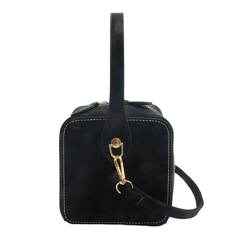 Women’s mini handbag with detachable shoulder strap and elegant flap closure