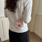 Women’s mini handbag with decorative chain strap