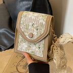 mini handbag with floral jacquard pattern and playful drawstring Nord bags
