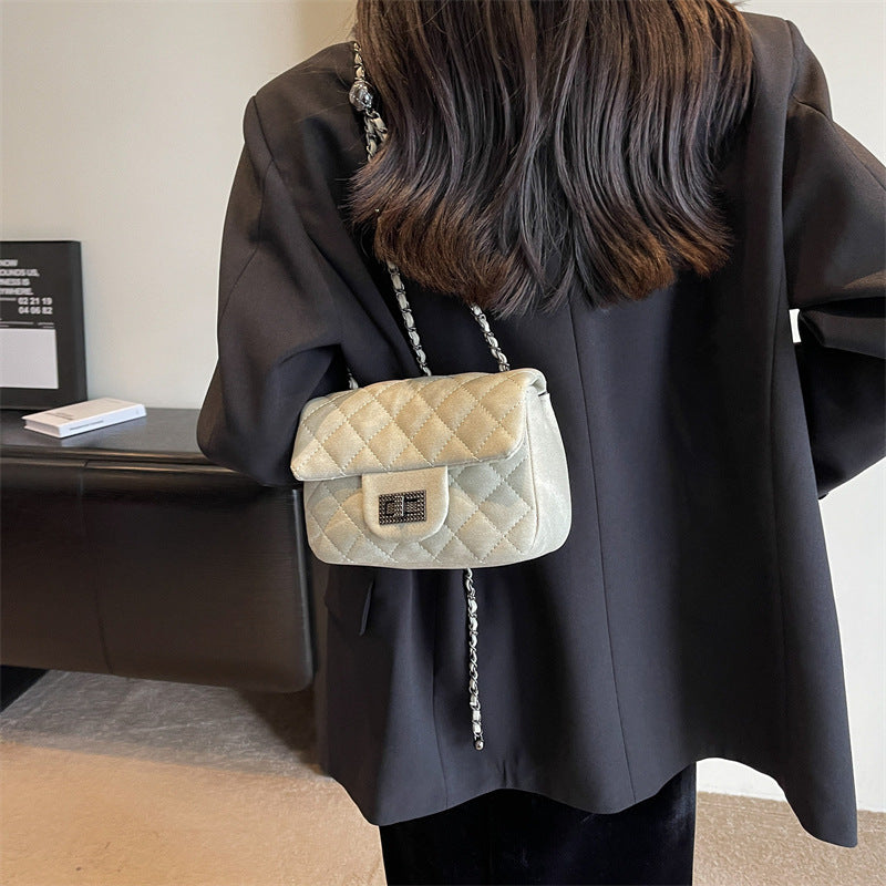 mini handbag with padded design and elegant chain strap