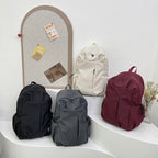 Backpack with Versatile Compartments and Charming Pendant