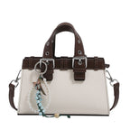 mini handbag with playful pendant and elegant design