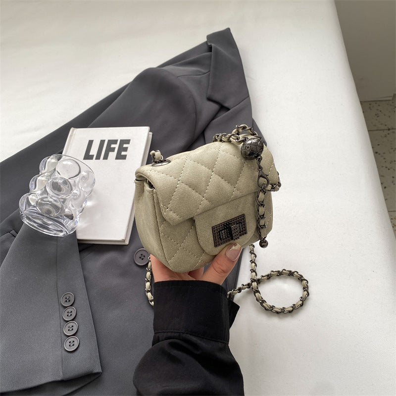 mini handbag with padded design and elegant chain strap