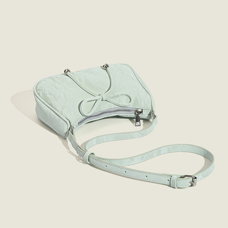 elegant mini handbag with playful drawstring Nord Bags