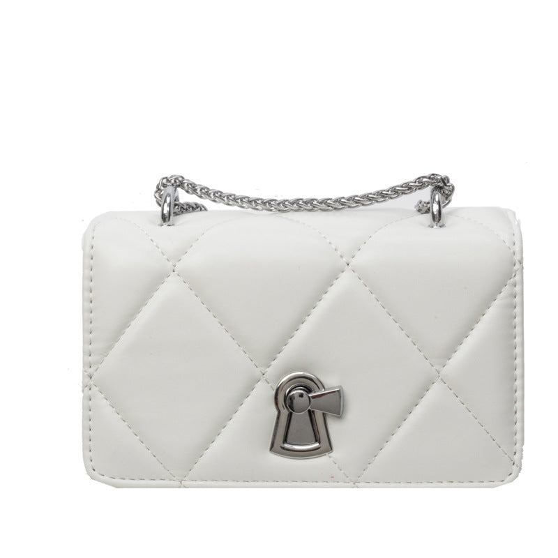 Ladies elegant mini handbag with striking quilted pattern