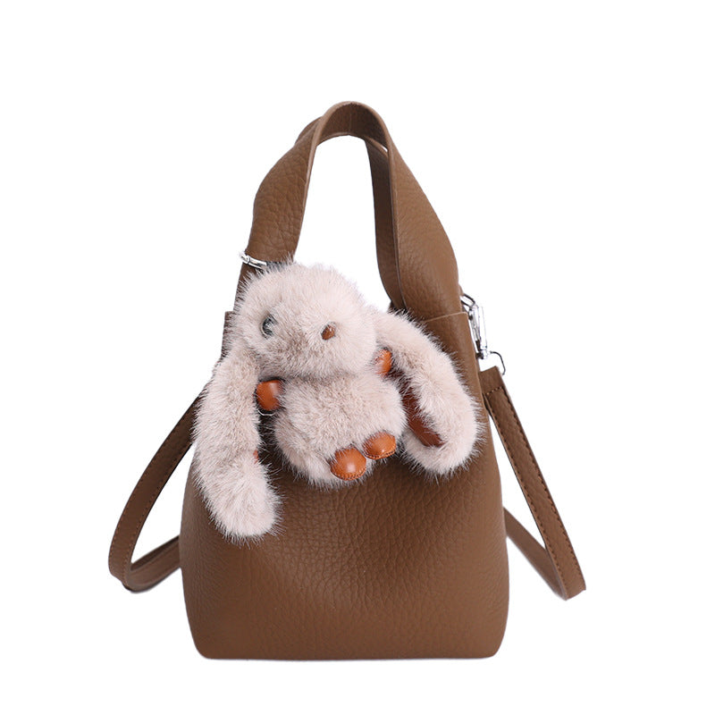 Women’s mini handbag with detachable plush pendant