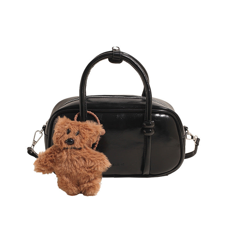 mini handbag with charming bear pendant