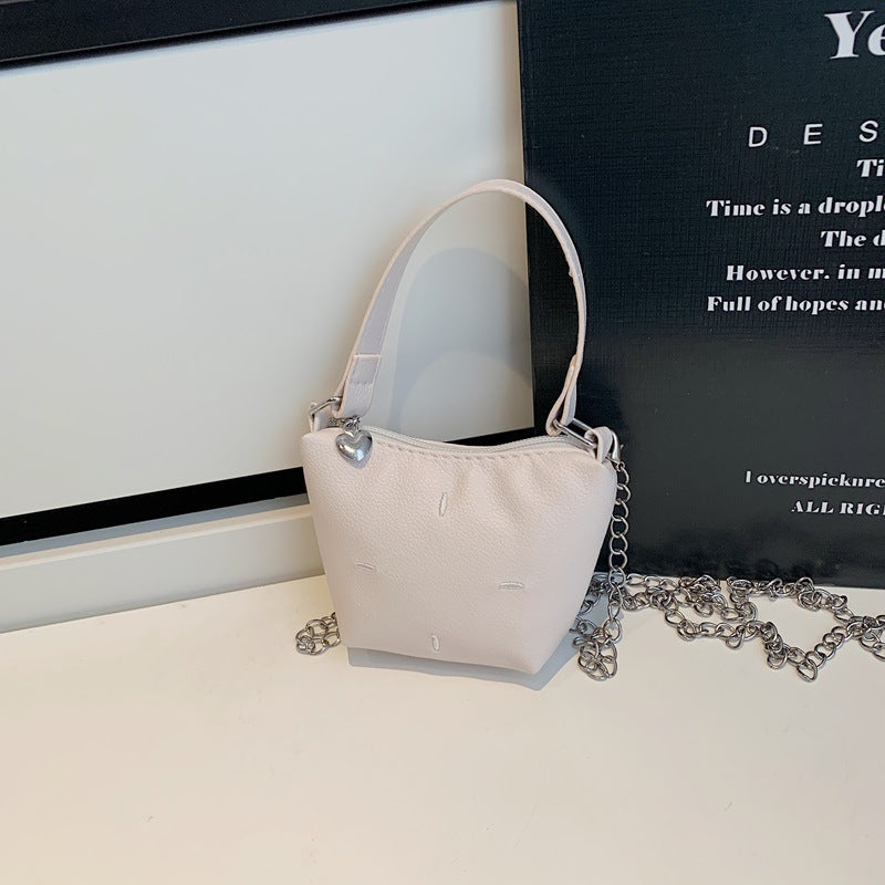 mini handbag with shiny chain and textured upper material