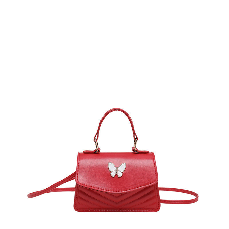 Chic Mini Handbag with Elegant Butterfly Accent