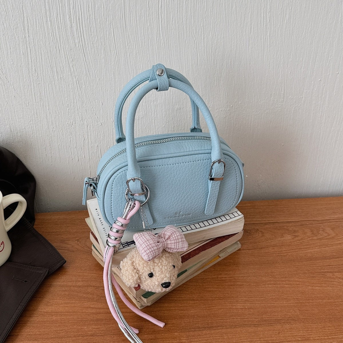 mini handbag with removable teddy keychain