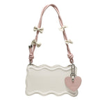 mini handbag with creative wave pattern and playful pendant