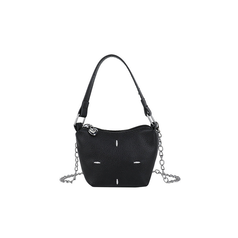 mini handbag with shiny chain and textured upper material