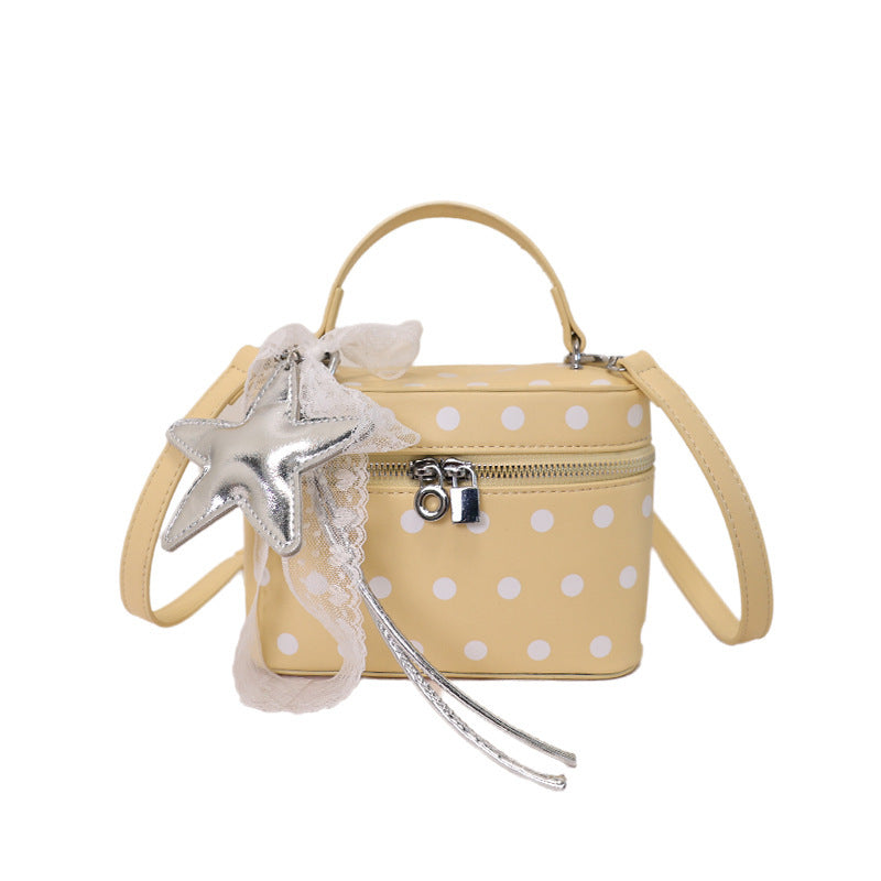 Women’s mini handbag with playful design and elegant accents