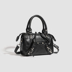 Ladies Mini handbag with decorative metal accents and detachable shoulder strap Nord Bags