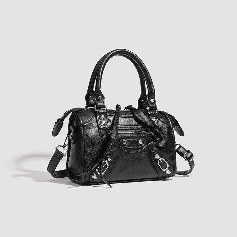 Ladies Mini handbag with decorative metal accents and detachable shoulder strap Nord Bags