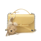 Ladies elegant mini handbag with cute pendant
