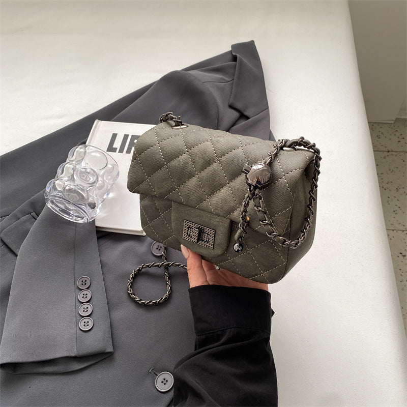 mini handbag with padded design and elegant chain strap