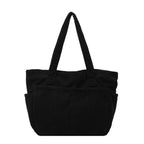 Multifunctional shoulder bag with large outer pockets