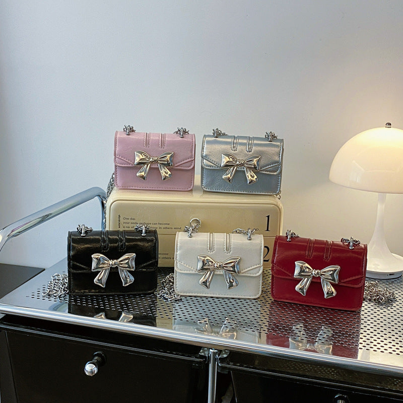 Mini Handbag with Shimmering Bow Closure