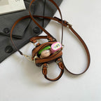 mini handbag with luxurious accents and adjustable shoulder strap Nord Bags