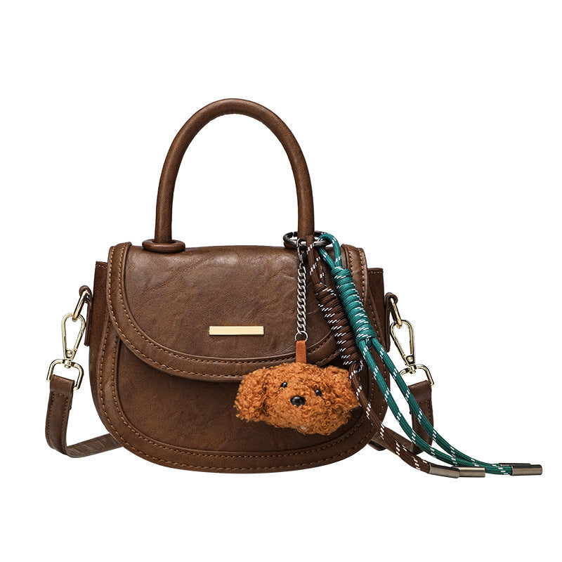 mini handbag with playful detail and high-quality synthetic leather