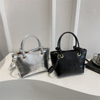 elegant mini handbag with textured design and detachable shoulder strap