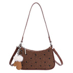 Women trendy mini handbag with playful animal pendant